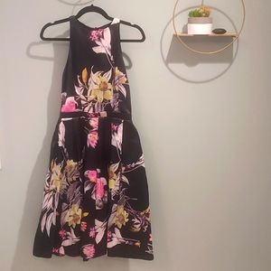 Floral sleeveless pleated dress. Size Small. Brand: Red Isabel